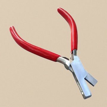 3mm leather strap notching pliers with red PVC handles, full view