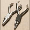 Set of two stainless steel orthodontic pliers, one round-nose and one flat-nose, on a white background.