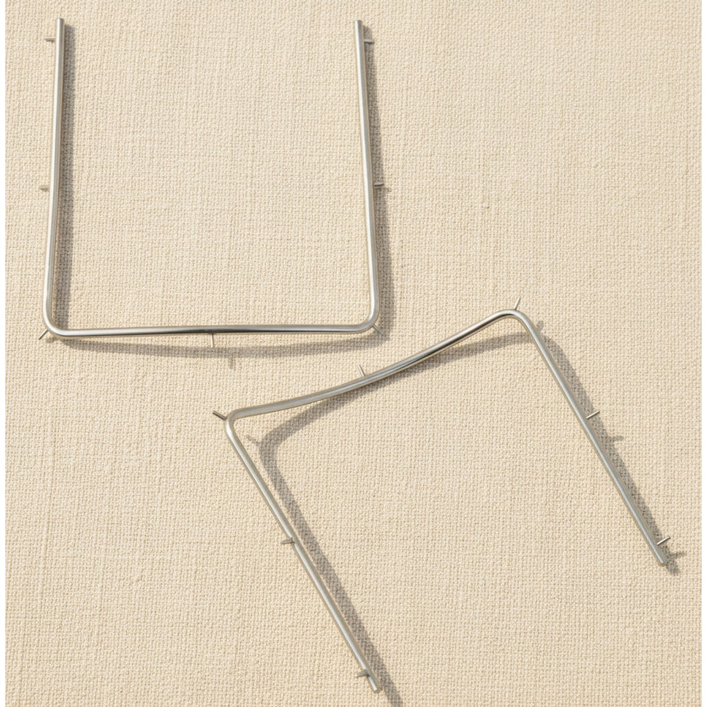 Autoclavable stainless steel rubber dam frame shown from the front.