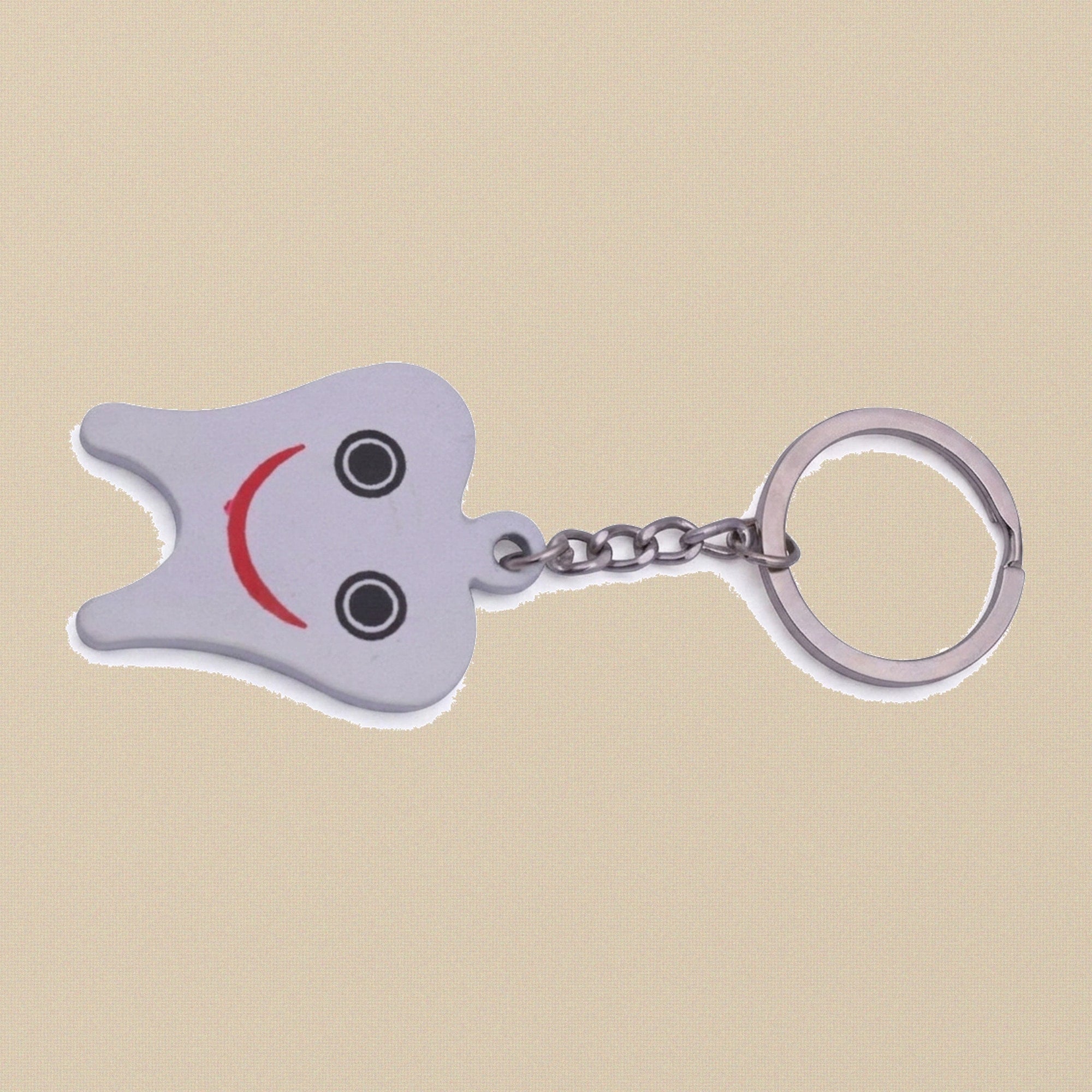 Miniature Dental & Medical Instrument Keyrings in 18 Assorted Styles — White Large Smiley Tooth