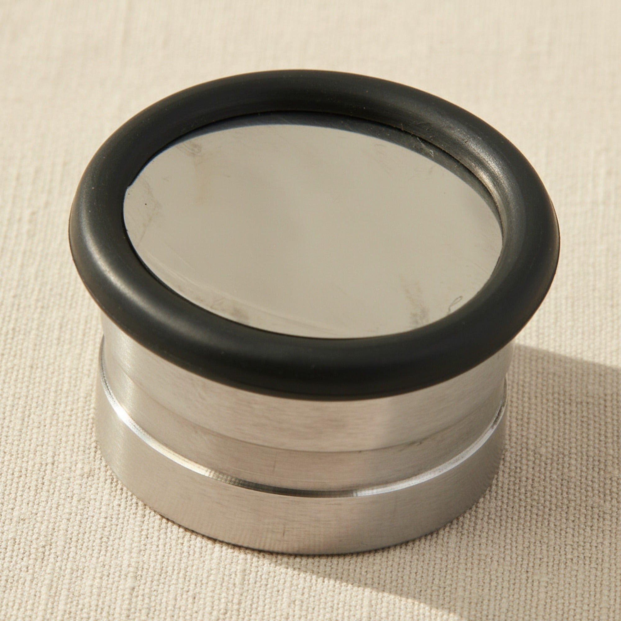 Angled view of the medical-grade stainless steel mixing well on a white background.