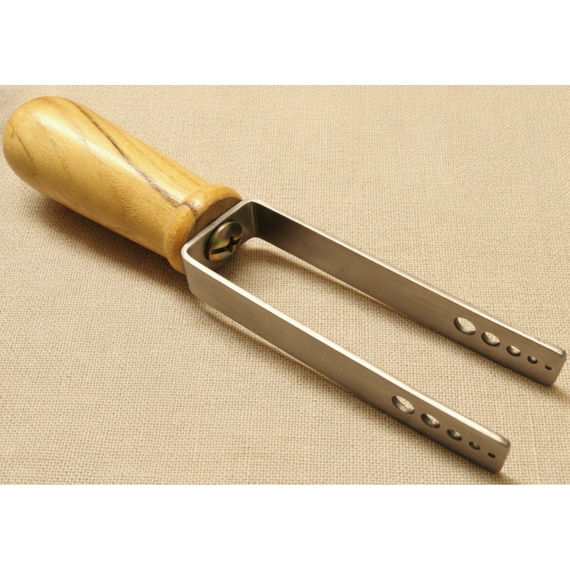 Manual wire coiling tool with 5 spindles and wooden handle