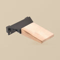 Hardwood bench peg fitted to its black steel clamp mount