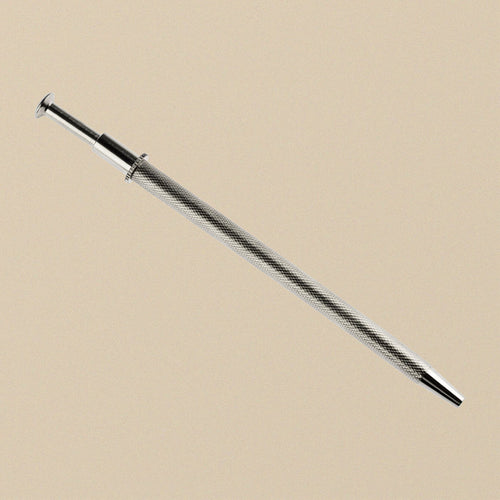 4 prong gem stone holder, 150mm, knurled steel body with plunger button at the end, full length on a plain background