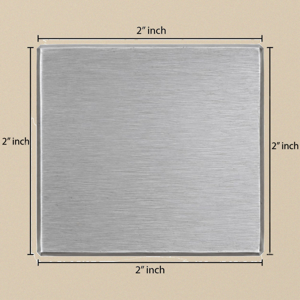 Solid steel bench block, top view of the brushed square face with 2 inch sides marked