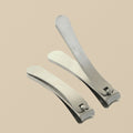 Professional German steel nail clippers in two sizes, small and large, on a white background.