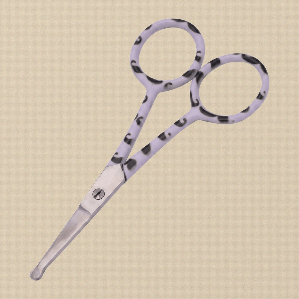Close-up of the rounded safety tips on the 4-inch stainless steel grooming scissors, demonstrating the safe design.