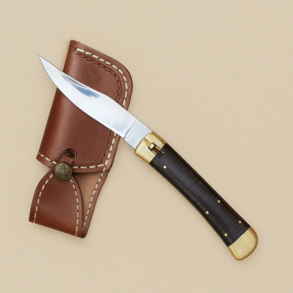 Folding utility knife open across its dark brown leather sheath on a beige background
