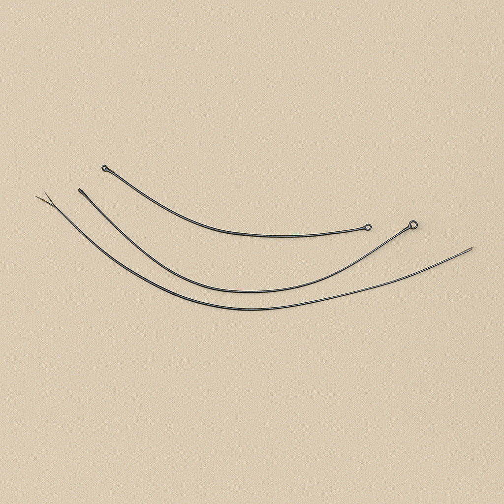 Gigli saw set, the three wires stretched out in loose curves