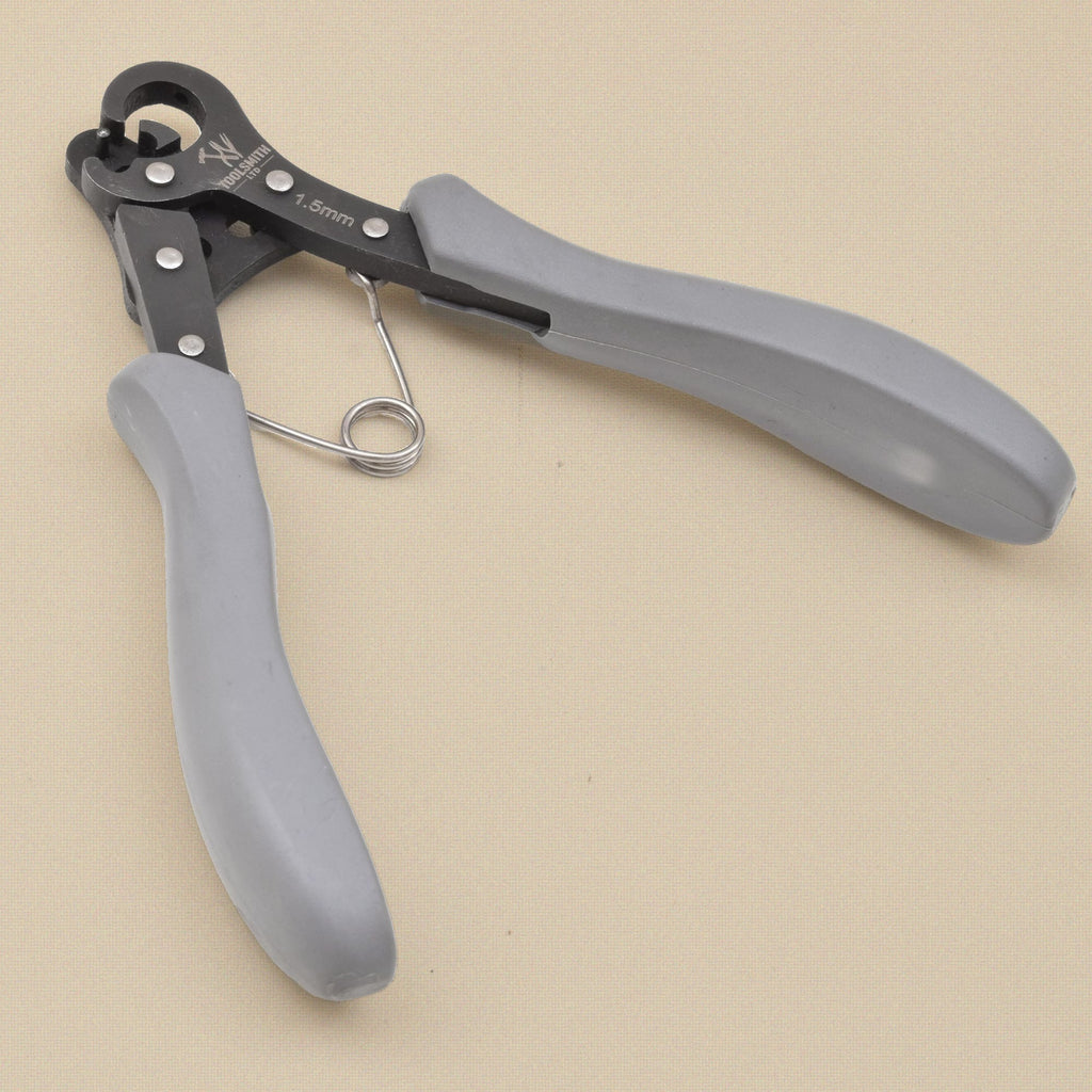 One step looper pliers with black head marked '1.5mm', grey grips and a coil spring, jaws open at top left