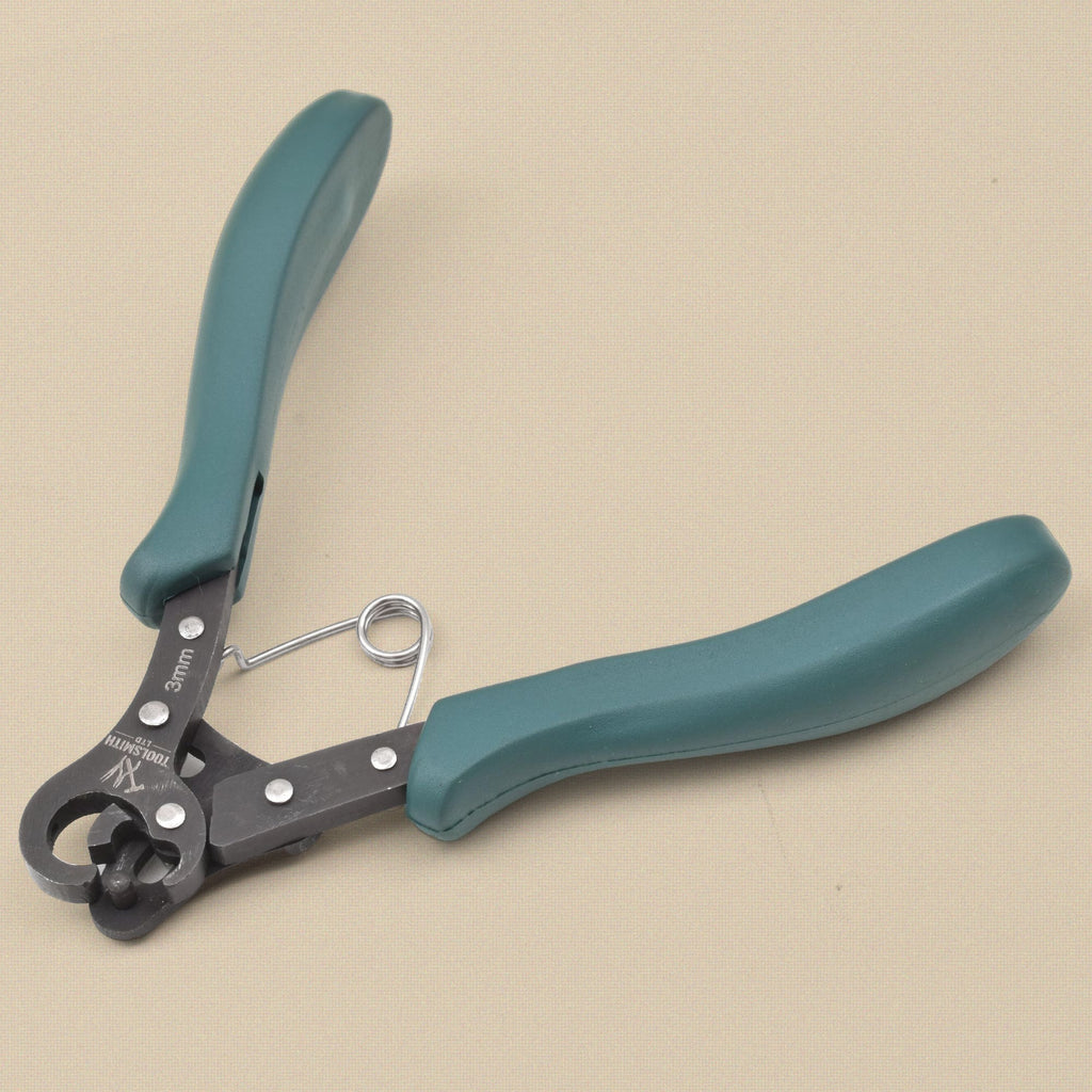 One step looper pliers, 3 mm, teal grips, seen from the other side with the looping head at lower left