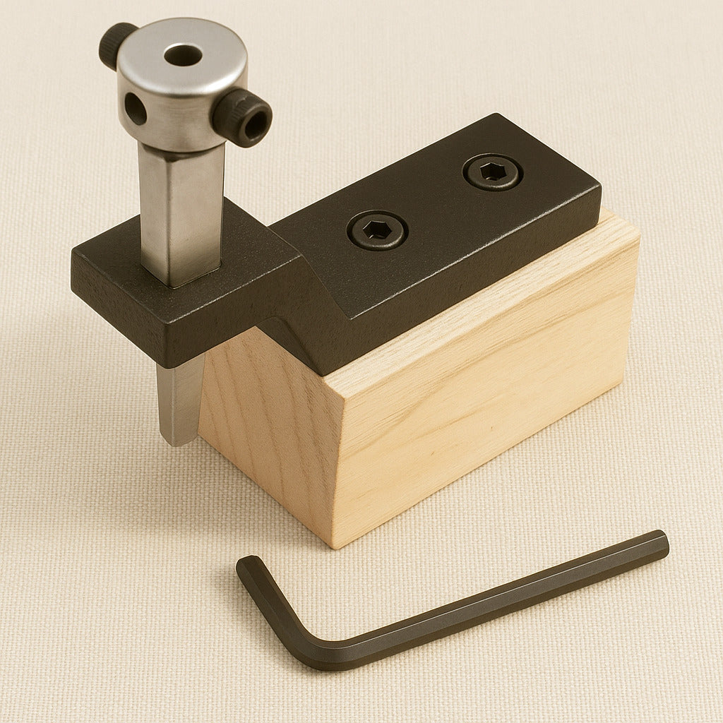 Micro forming set, the black stake holder mounted on its pale wooden block with the hex key in front