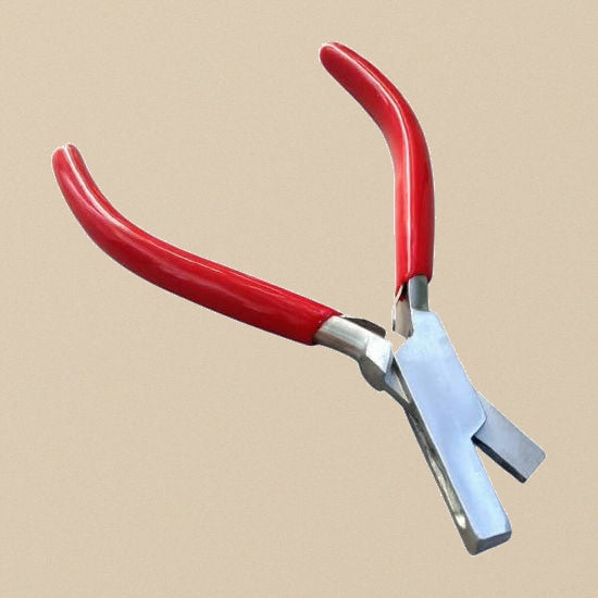 3mm leather strap notching pliers with red PVC handles, full view