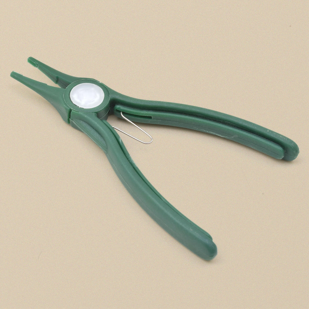 Green plastic chain nose pliers at an angle