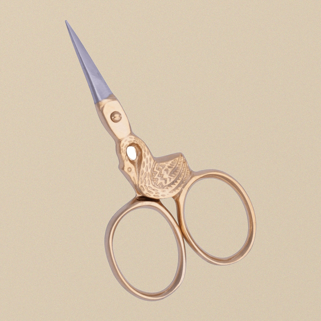 Detail shot of the fine, sharp tips of the 76 mm swan embroidery scissors.