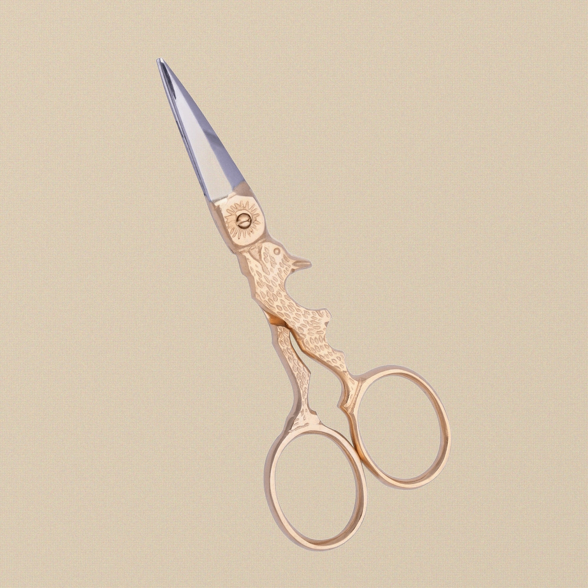 Close-up of the sharp blades and gold-plated finish on the 4-inch rabbit scissors.