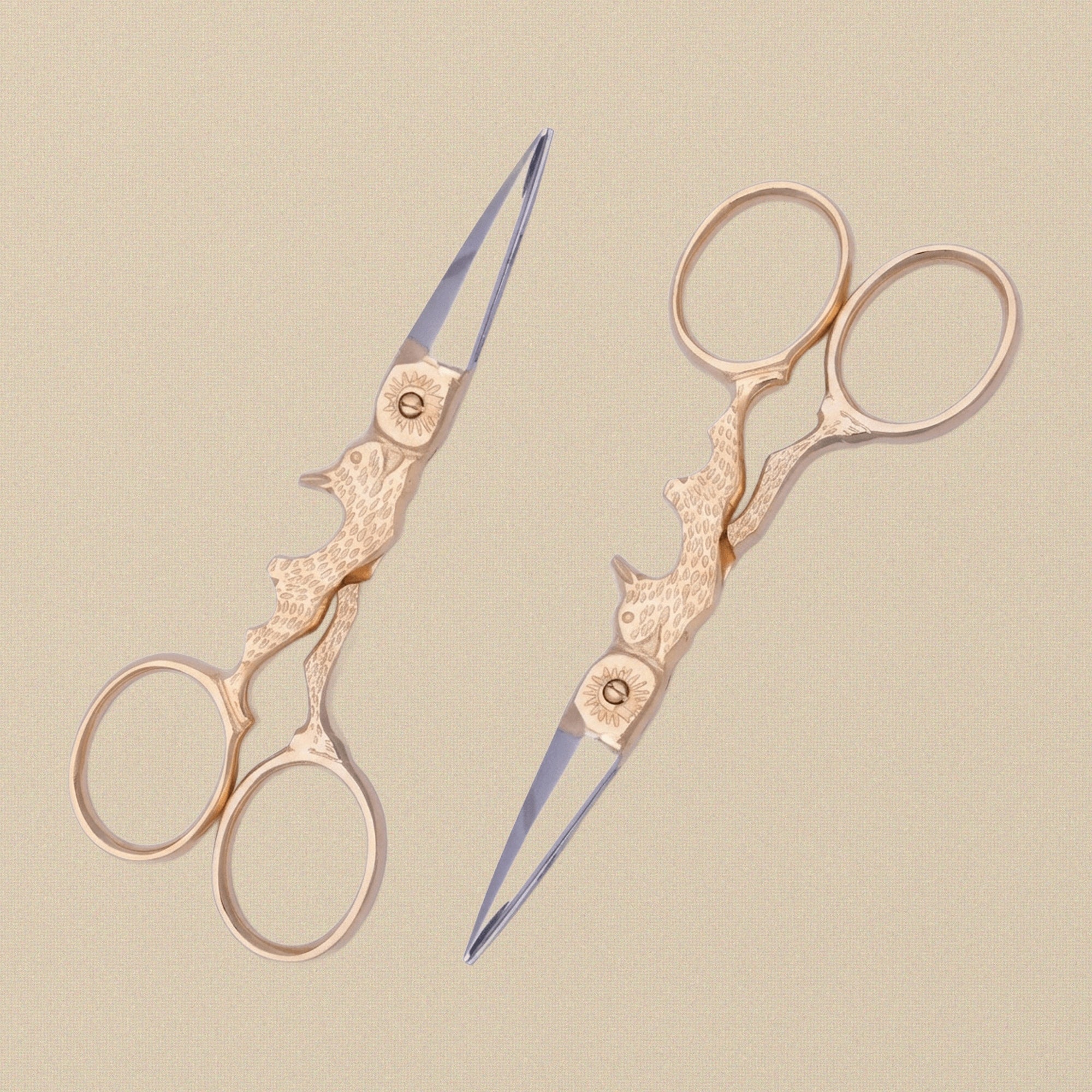 Detail view of the rabbit-shaped handles of the craft scissors.