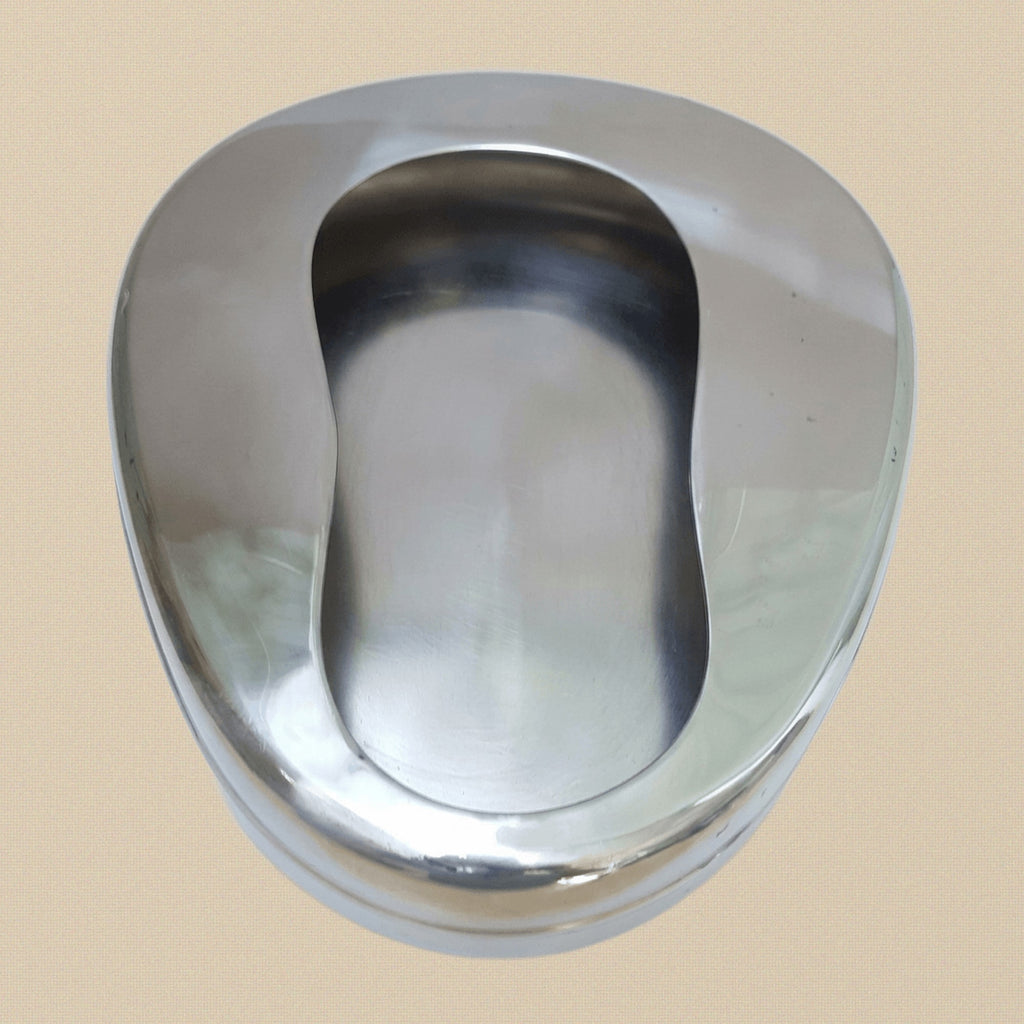 Side profile of the stainless steel bedpan, showing its 50 mm depth and contoured edge.