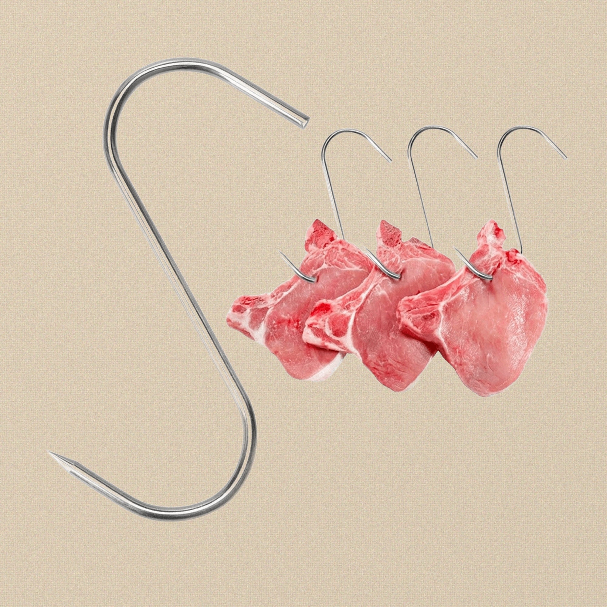 Multiple S-hooks hanging from a steel rail, demonstrating their use in a butchery setting.