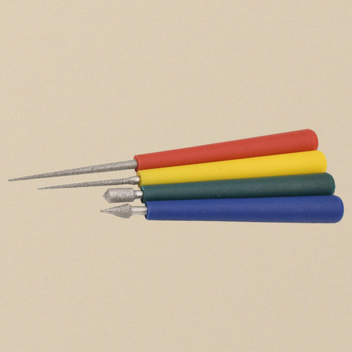 Bead reamer set, the 4 reamers laid side by side showing two tapered and two cone-shaped diamond points