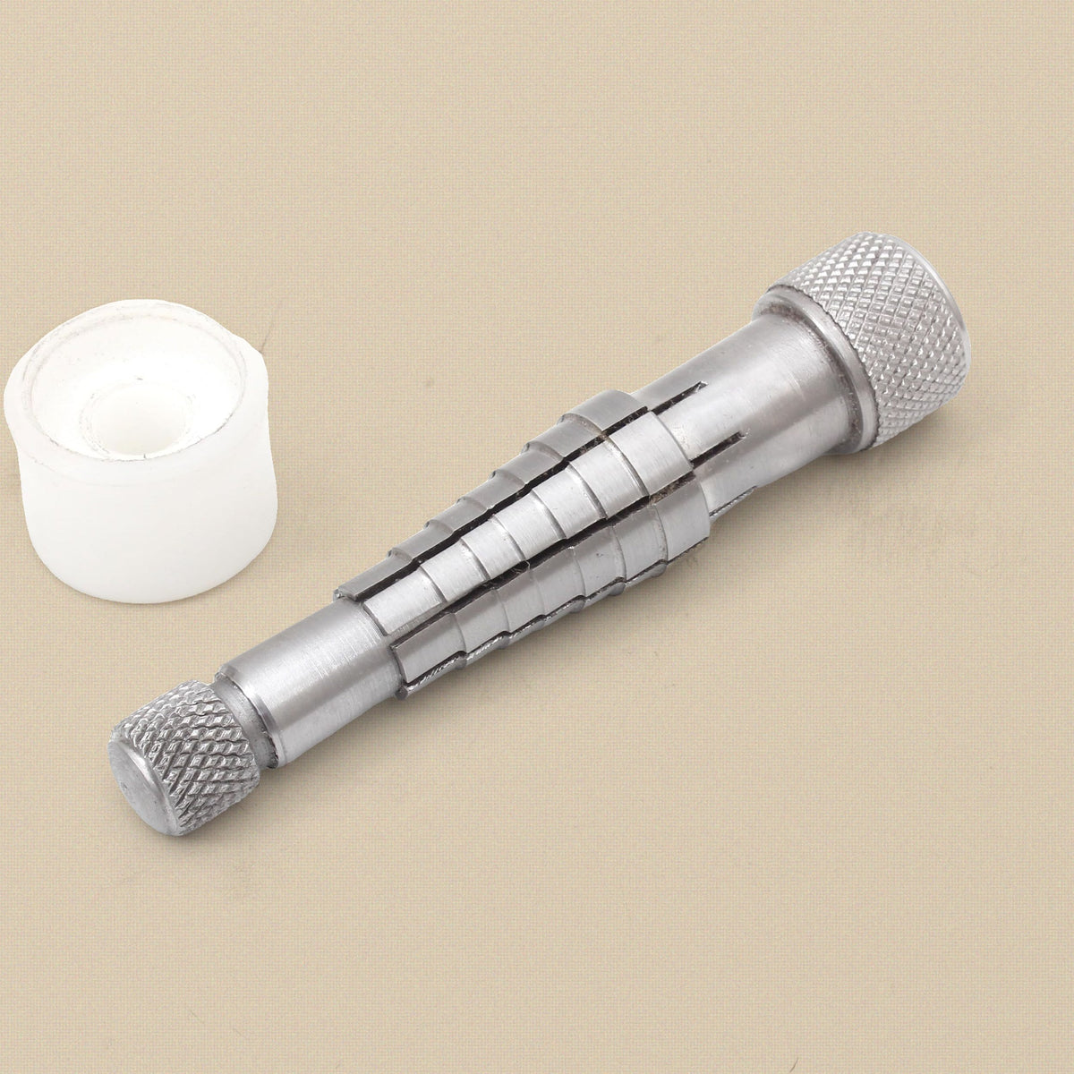 Ring stretcher mandrel with knurled cap and white nylon base band