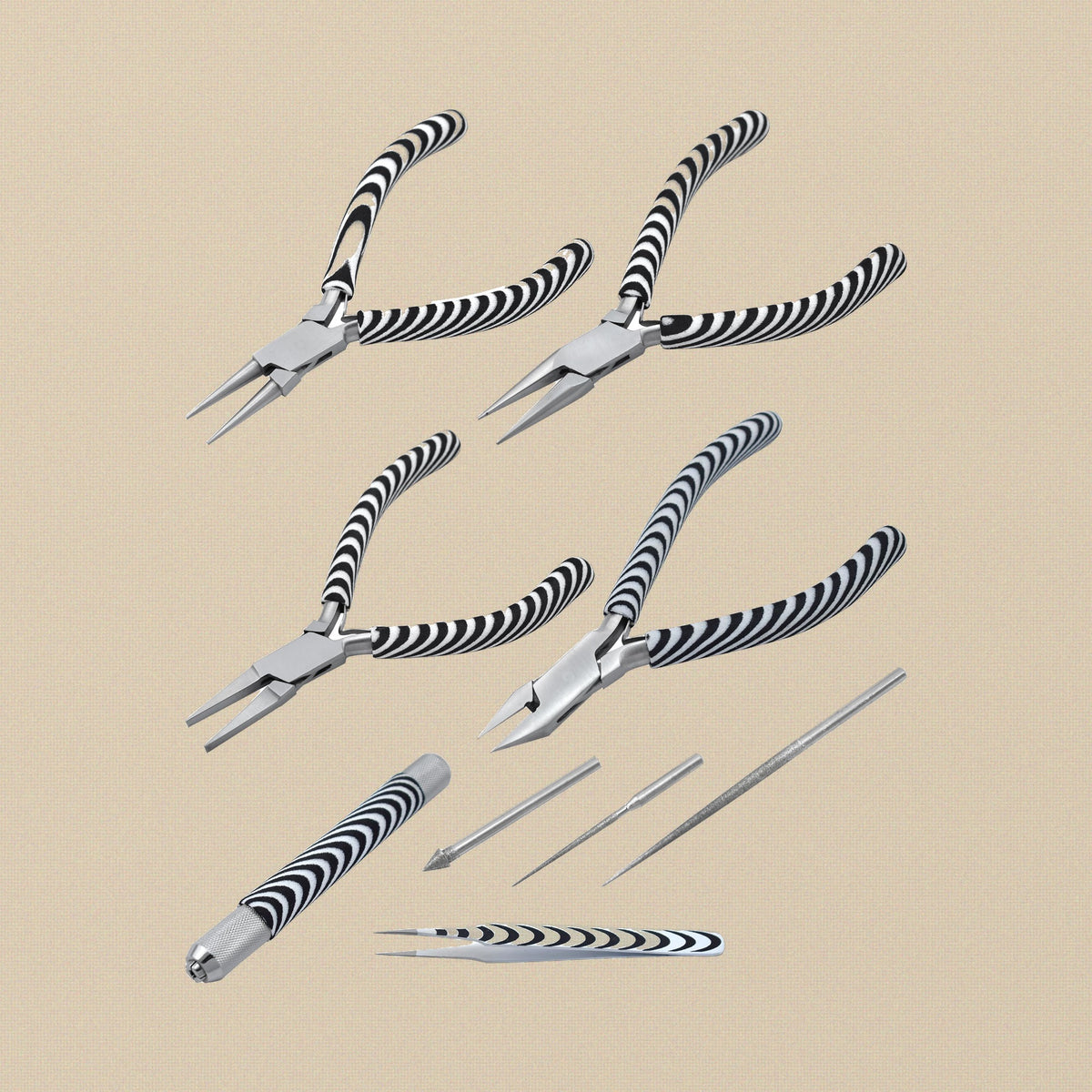 Six-piece jewellery making tool kit with zebra grips laid out